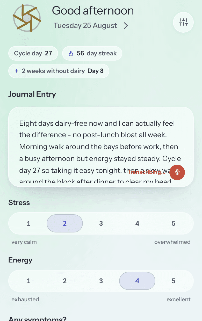 The journal entry box mid-dictation: the mic button is live and red while the sentence types itself out as it is spoken